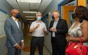 罗杰哈维, professor of ocean and earth sciences (center), talks about climate change before touring the COSMIC Lab with (l-r)Virginia House Del. Angelia Williams Graves, Gubernatorial Candidate and Former Gov. Terry McAuliffe and President Brian O. Hemphill, Ph值.D. Photo Chuck Thomas/ODU.