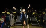 Students could not contain their excitement as they walk off the stage. Photo Chuck Thomas/ODU