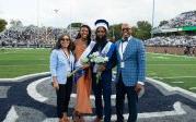 Old Dominion University President Brian O. Hemphill, Ph值.D., and First Lady Marisela Rosas Hemphill, Ph值.D., pose with the 同学会 Royalty Court winners Demetré South and Caitlyn Kidd. Photo Chuck Thomas/ODU