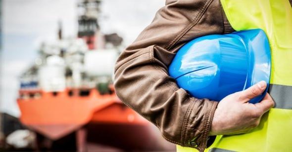 Man holding a helmet