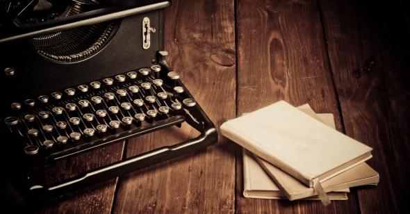 Photo of a typewriter on a desk.